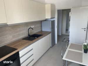 Garsonieră de închiriat, 50mp, balcon — miniatura 4
