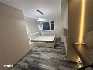 Inchiriez 2 camere cu parcare subterana vis a vis mall Coresi — miniatura 4