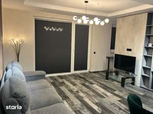 Inchiriez 2 camere cu parcare subterana vis a vis mall Coresi — miniatura 6