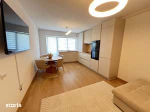 De inchiriat-apartament-2 camere-open space-nou-mobilat-utilat-parcare — miniatura 4