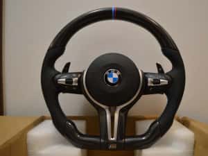 Volan Carbon BMW Seria 1 2 3 4 5 6 7 X1 X2 X3 X4 X5 X6 E/F F01 F02 F03 F04 F06 F12 F13 F15 F16 F10 F20 F25 F26 F30 F32 F33 F36 E90 E91 E70 E71 E81 E84