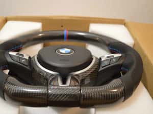 Volan Carbon BMW Seria 1 2 3 4 5 6 7 X1 X2 X3 X4 X5 X6 E/F F01 F02 F03 F04 F06 F12 F13 F15 F16 F10 F20 F25 F26 F30 F32 F33 F36 E90 E91 E70 E71 E81 E84 — miniatura 5