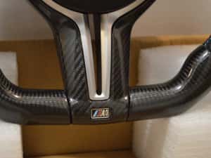 Volan Carbon BMW Seria 1 2 3 4 5 6 7 X1 X2 X3 X4 X5 X6 E/F F01 F02 F03 F04 F06 F12 F13 F15 F16 F10 F20 F25 F26 F30 F32 F33 F36 E90 E91 E70 E71 E81 E84 — miniatura 6