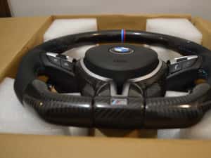 Volan Carbon BMW Seria 1 2 3 4 5 6 7 X1 X2 X3 X4 X5 X6 E/F F01 F02 F03 F04 F06 F12 F13 F15 F16 F10 F20 F25 F26 F30 F32 F33 F36 E90 E91 E70 E71 E81 E84 — miniatura 9