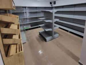 Rafturi metalice si produse pentru amenajarea magazinului — miniatura 8