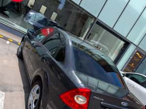 Ford Focus - pachet Ghia (Full), încălzire scaune- pilot automat- parbriz încălzit - xenon- spălător faruri — miniatura 1