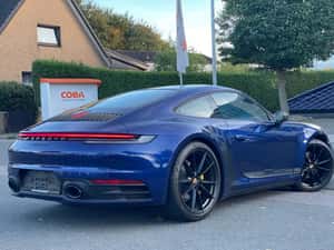 Porsche 911 Carrera T Coupe in special paint "Gypsy Blue Metallic" — miniatura 4