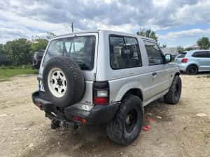 Vand Mitsubishi Pajero mk2 2.5 superselect blocant spate ,cu acte — miniatura 4