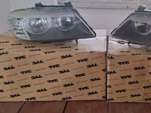 Vand faruri originale BMW E90