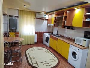 Apartament ultracentral  cu 2 camere decomandate + Living — miniatura 4