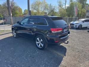 Jeep Grand Cherokee 4x4 250 CP. Fara daune in istoric — miniatura 4