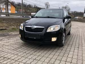 Skoda Fabia an 2008 motor 1.9tdi 105 cp cod BLS climatic geamuri electrice oglinzi electrice parktronic — miniatura 10
