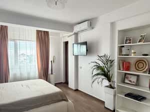Apartament cu 2 camere, loc de parcare, curte cu loc de joacă, foișor — miniatura 4