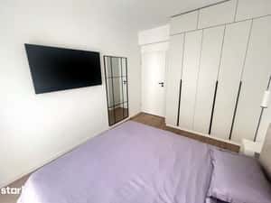 Vând apartament cu 3 camere, 2 băi, balcon generos – 68,6 mp utili — miniatura 5