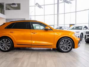 Audi Q8 55TFSI-e, 2021, 66.400 km, Hibrid, Portocaliu — miniatura 6