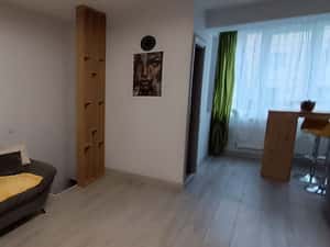 Garsoniera de închiriat + o camera de 18 mp, utilată si mobilata. — miniatura 4