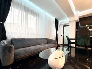 Apartament frumos amenajat de inchiriat cu centrala si parcare — miniatura 5