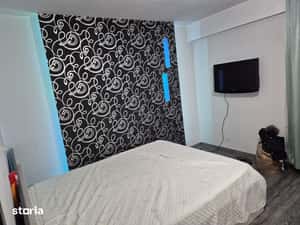 Inchiriez apartament 2 camere decomandat,etaj4/4,1MAI,zona Pelendava — miniatura 4