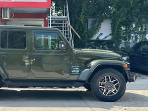 Jeep Wrangler 2.0 4xe AT8 PHEV Sahara Automată 380 HP Hibrid — miniatura 4