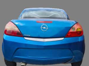 Carenaj roata dreapta fata Opel Tigra B — miniatura 5