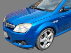 Carenaj roata dreapta fata Opel Tigra B — miniatura 7