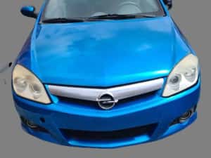 Carenaj roata dreapta fata Opel Tigra B — miniatura 8