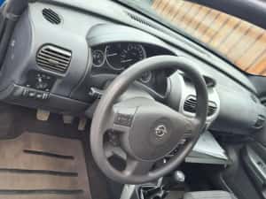Carenaj roata dreapta fata Opel Tigra B — miniatura 10